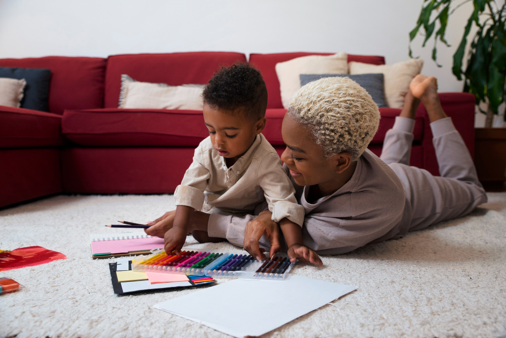 Nigerian mother sitting quietly with her autistic child, holding the child gently