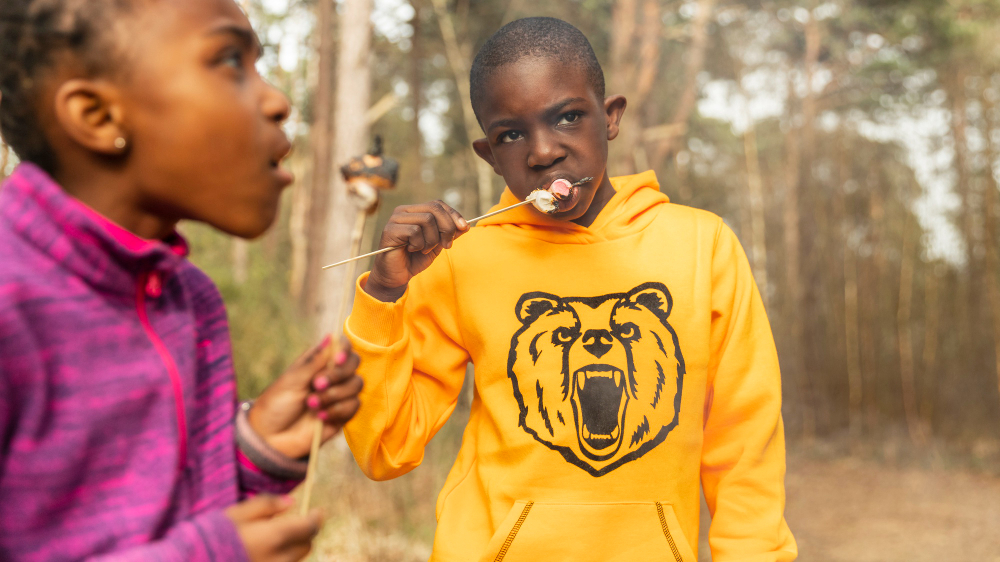 Nigerian parent guiding their autistic child through a calm morning routine at home